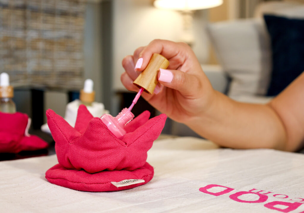 Nail Polish Holder - MYnailPOD nail polish bottle holder. Paint your nails with no spills. Flower shaped pink nail polish bottle holder